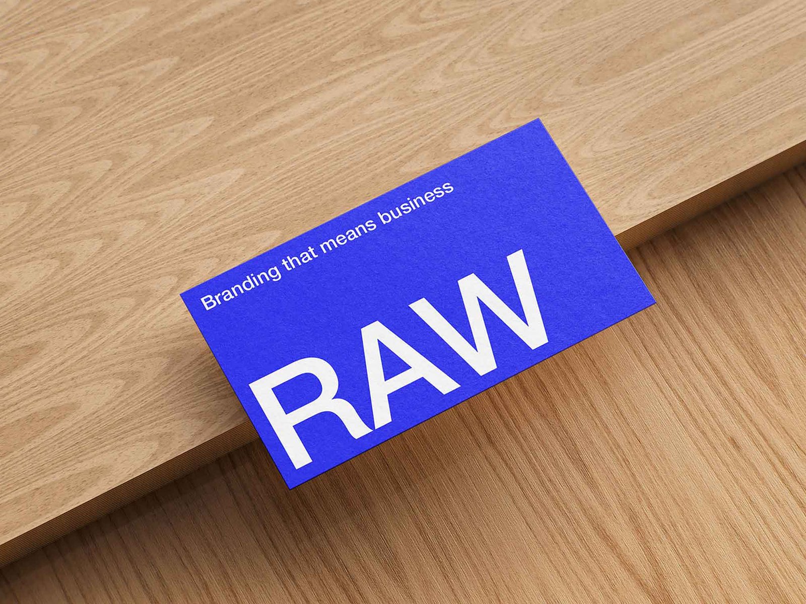 Business Card Mockup on Woodgrain Background